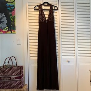 Sleek Brown halter gown with beaded plunge top